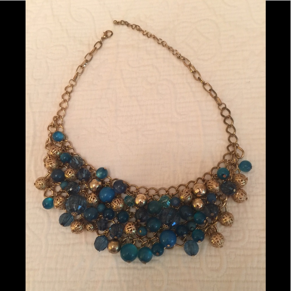 Gold tone necklace with turquoise & gold beads